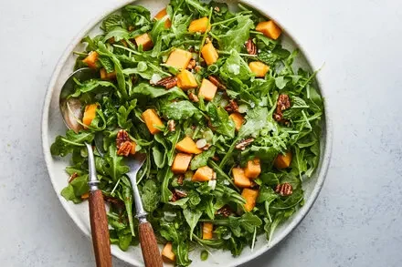 Wild Greens Salad With Persimmons and Hickory Nuts