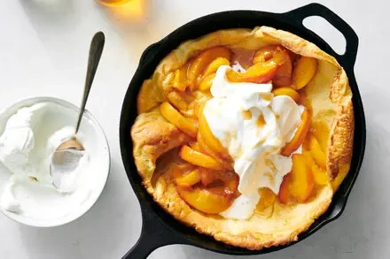Cardamom Dutch Baby With Caramelized Peaches
